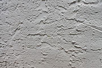 Rough stucco wall texture.